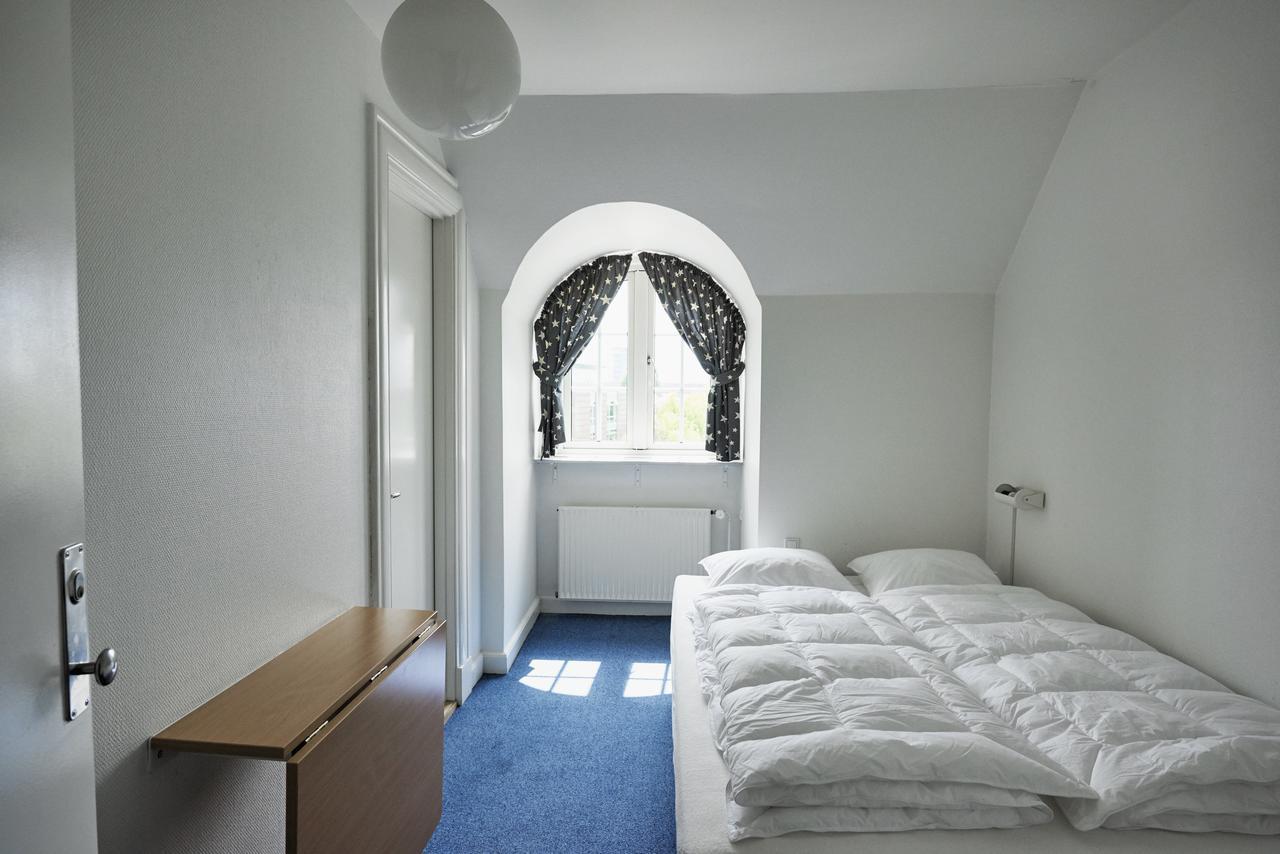 Danhostel Odense City ภายนอก รูปภาพ A bedroom at the hotel